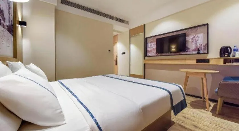 Bed in City Comfort Inn Dongguan Gaobu Avenue