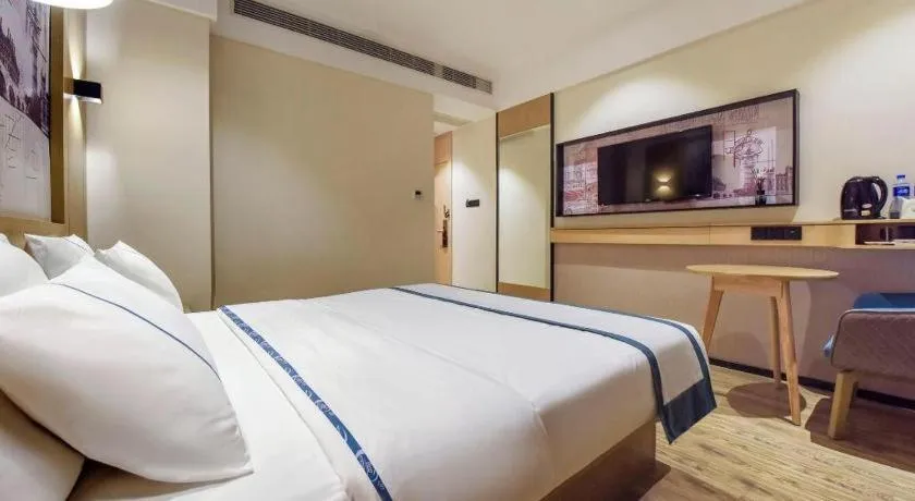 Bed in City Comfort Inn Dongguan Gaobu Avenue