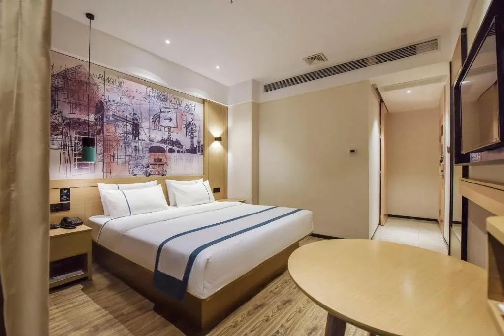 Bed in City Comfort Inn Dongguan Gaobu Avenue