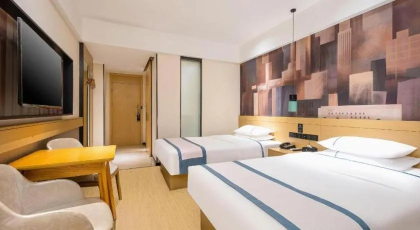 Bed in City Comfort Inn Dongfang Donghai Road Gymnasium Municipal Government