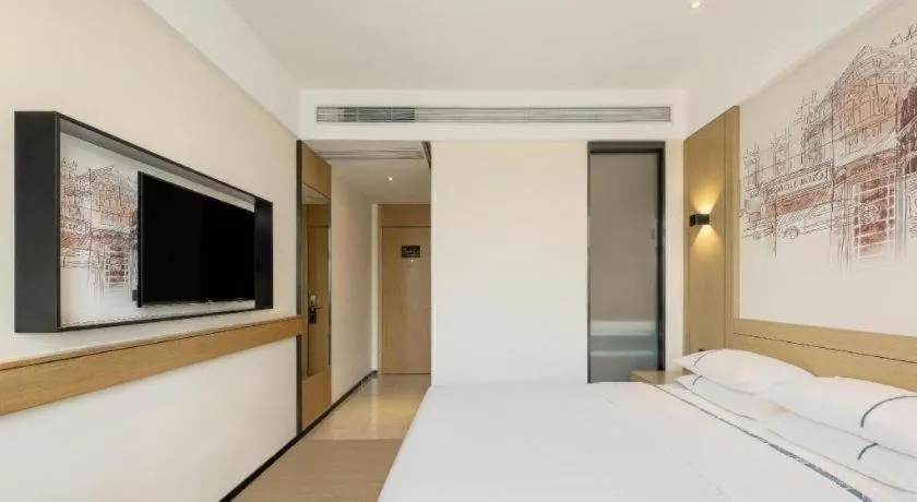 Bed in City Comfort Inn Dongfang Donghai Road Gymnasium Municipal Government