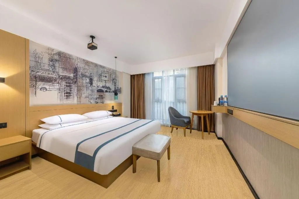 Bed in City Comfort Inn Dongfang Donghai Road Gymnasium Municipal Government