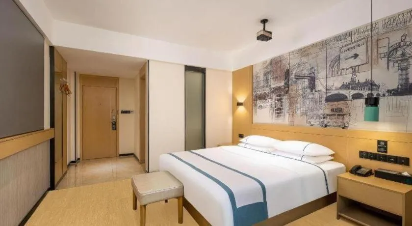 Bed in City Comfort Inn Dongfang Donghai Road Gymnasium Municipal Government