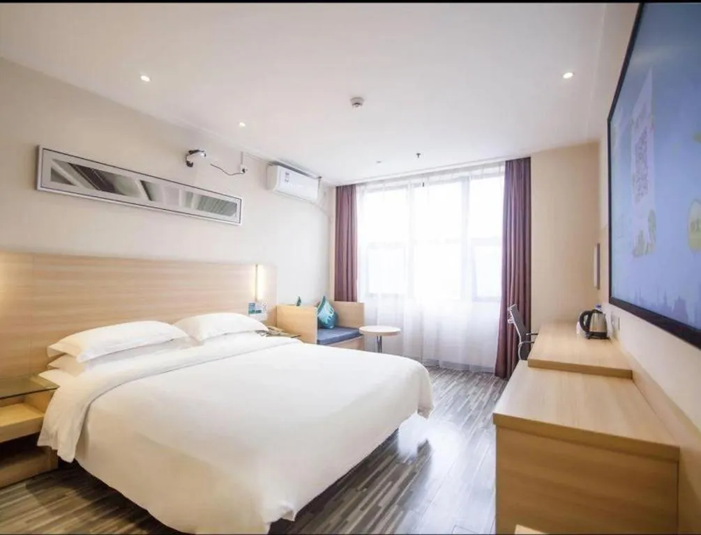 Bed in City Comfort Inn Yichang Dongshan Three Gorges University Shuiyuecheng
