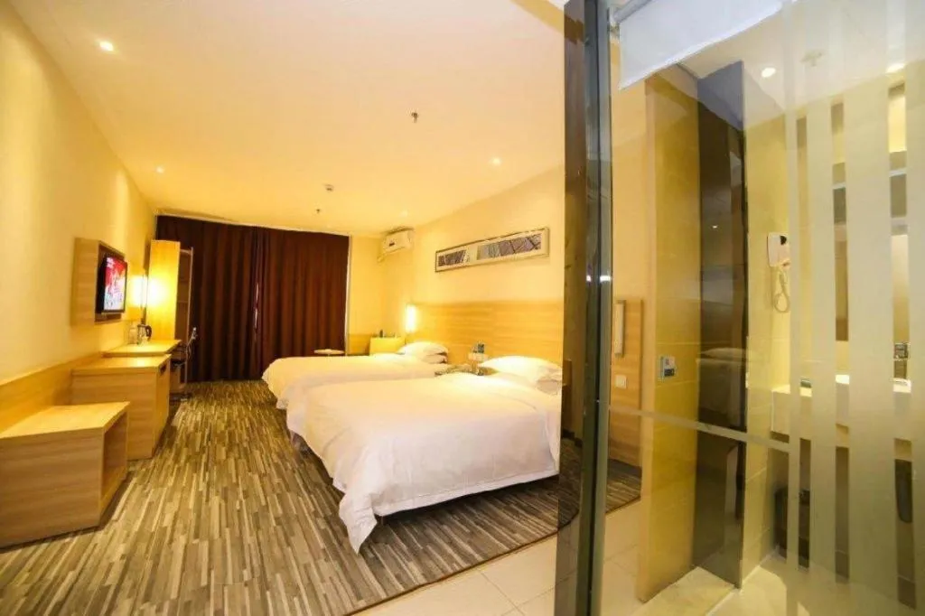 Bed in City Comfort Inn Yichang Dongshan Three Gorges University Shuiyuecheng