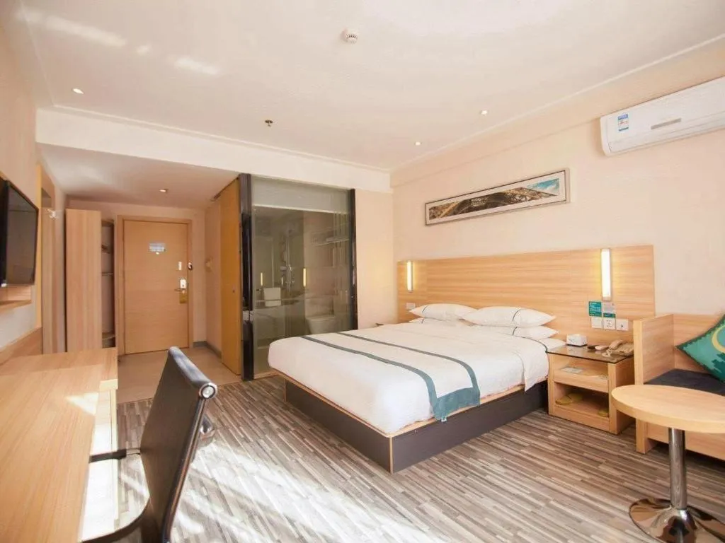 Bed in City Comfort Inn Yichang Dongshan Three Gorges University Shuiyuecheng