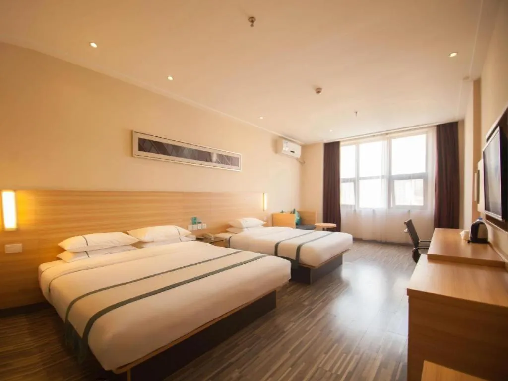 Bed in City Comfort Inn Yichang Dongshan Three Gorges University Shuiyuecheng