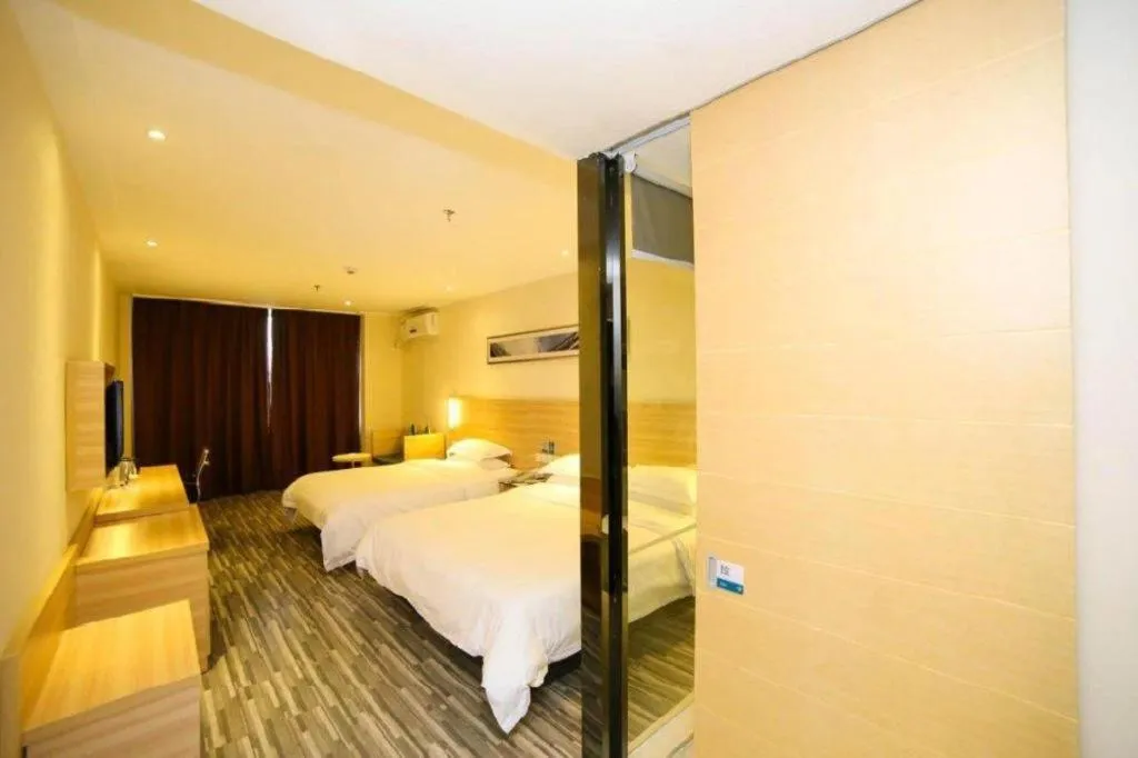 Bed in City Comfort Inn Yichang Dongshan Three Gorges University Shuiyuecheng