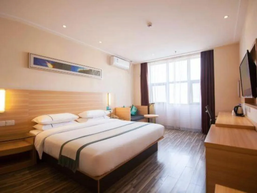 Bed in City Comfort Inn Yichang Dongshan Three Gorges University Shuiyuecheng