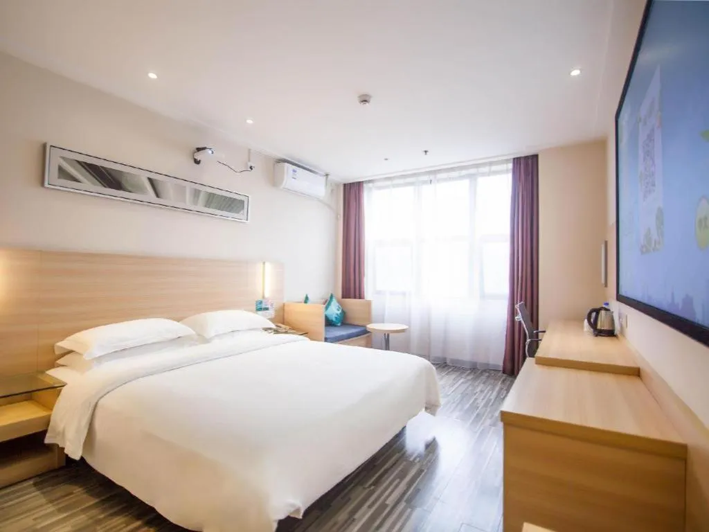 Bed in City Comfort Inn Yichang Dongshan Three Gorges University Shuiyuecheng