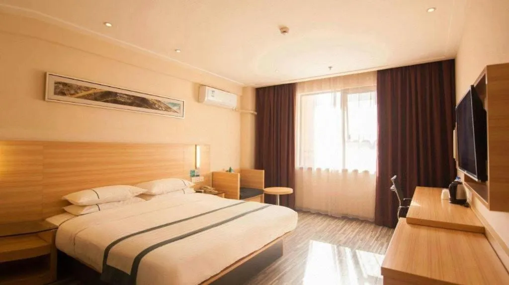 Bed in City Comfort Inn Yichang Dongshan Three Gorges University Shuiyuecheng