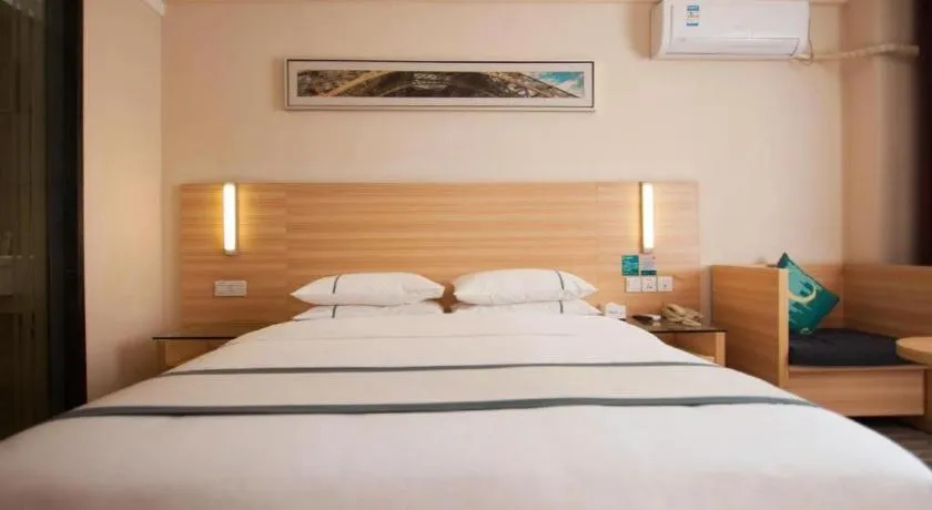 Bed in City Comfort Inn Yichang Dongshan Three Gorges University Shuiyuecheng