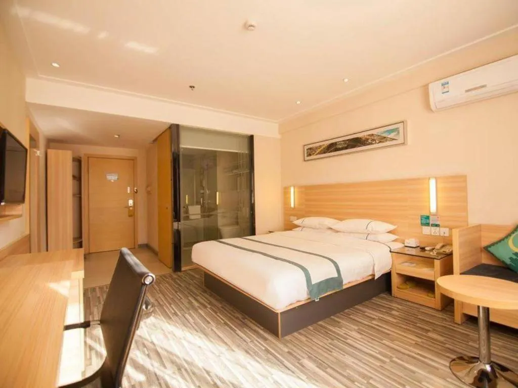 Bed in City Comfort Inn Yichang Dongshan Three Gorges University Shuiyuecheng