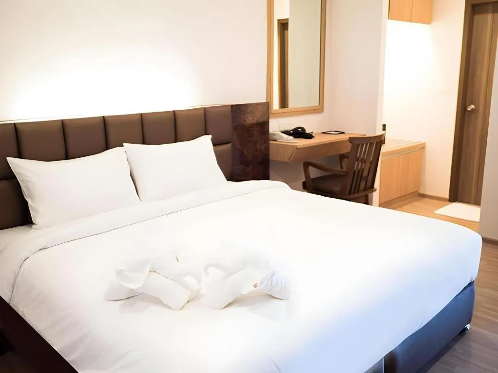 Bed in B2 Amata Nakorn Premier Hotel