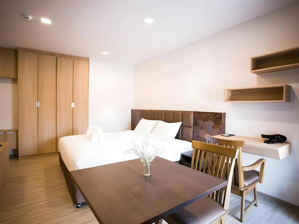 Bed in B2 Amata Nakorn Premier Hotel