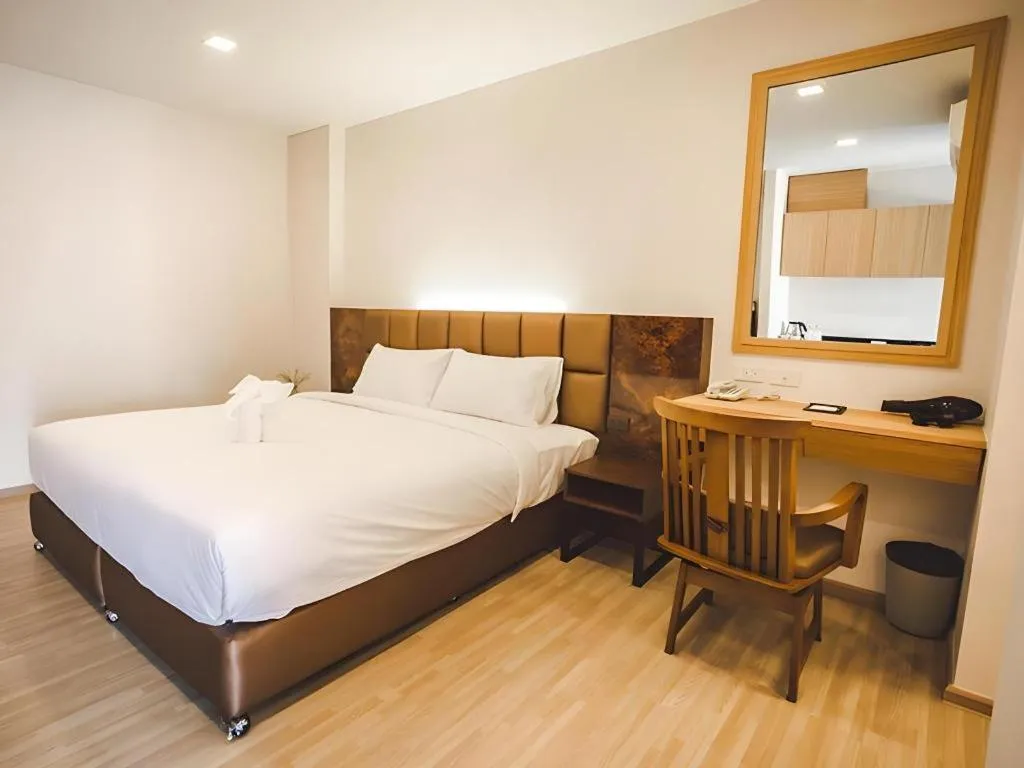 Bed in B2 Amata Nakorn Premier Hotel