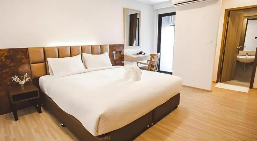 Bed in B2 Amata Nakorn Premier Hotel