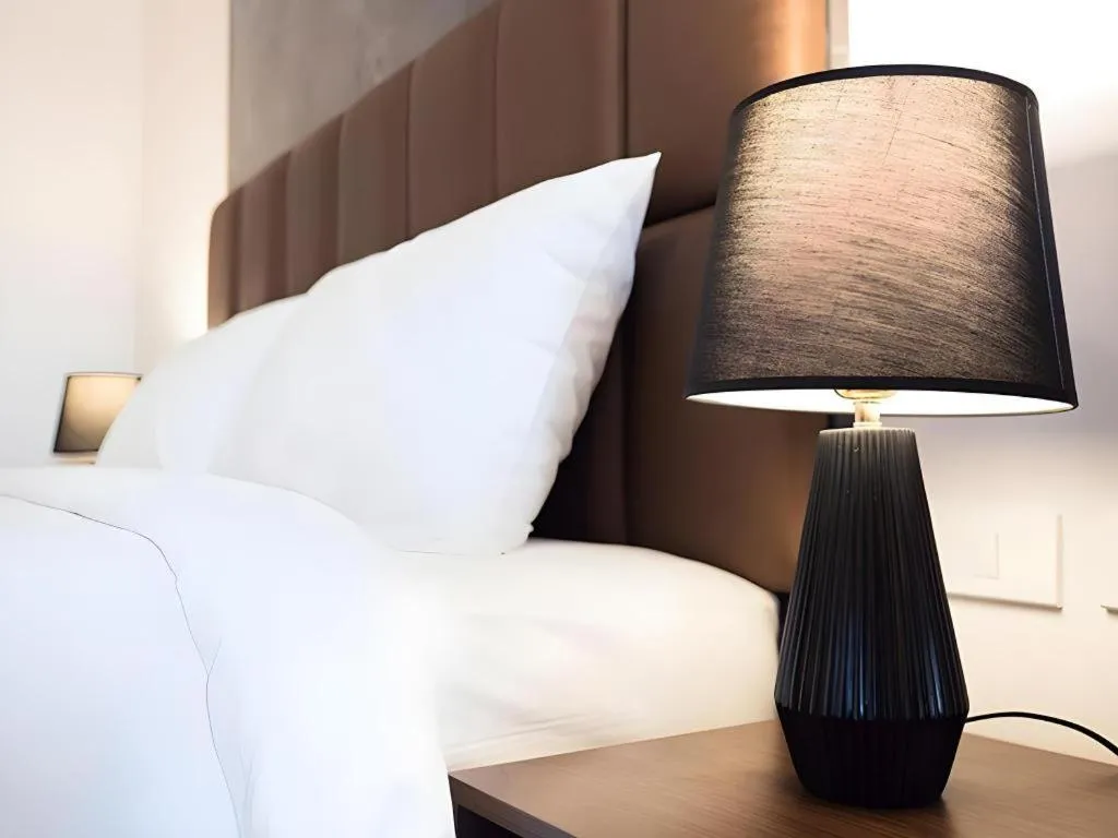 Bed in B2 Amata Nakorn Premier Hotel