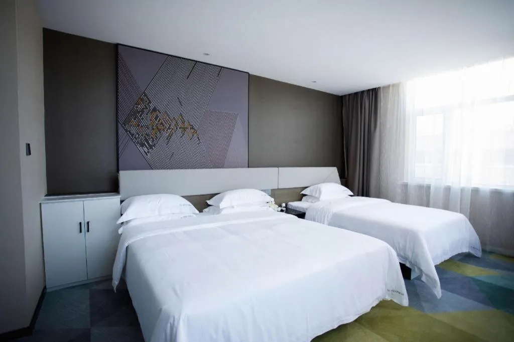 Bed in IU Hotels· Xincheng Haibing University Store