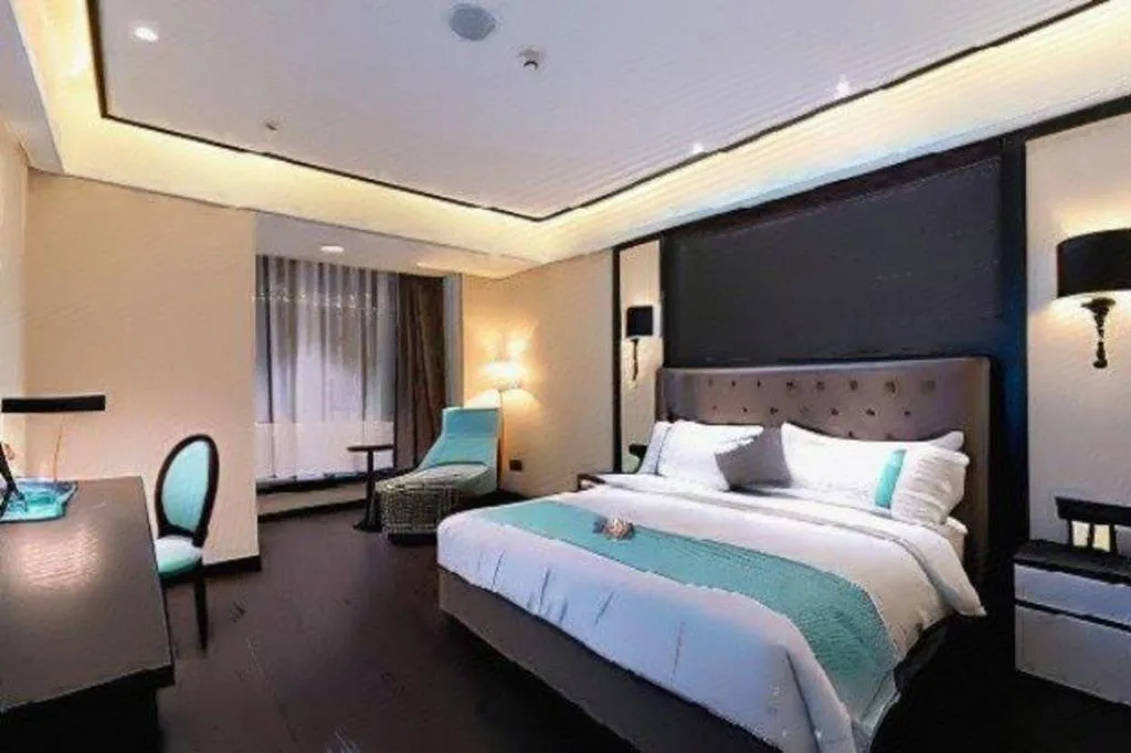 Bed in Xana Hotelle· Wulumuqi High Speed Railway Station Baonengcheng