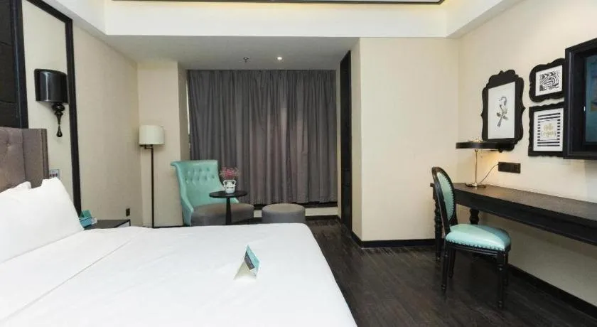 Bed in Xana Hotelle· Wulumuqi High Speed Railway Station Baonengcheng