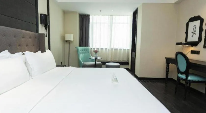 Bed in Xana Hotelle· Wulumuqi High Speed Railway Station Baonengcheng