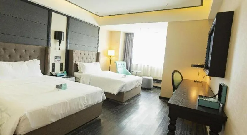 Bed in Xana Hotelle· Wulumuqi High Speed Railway Station Baonengcheng