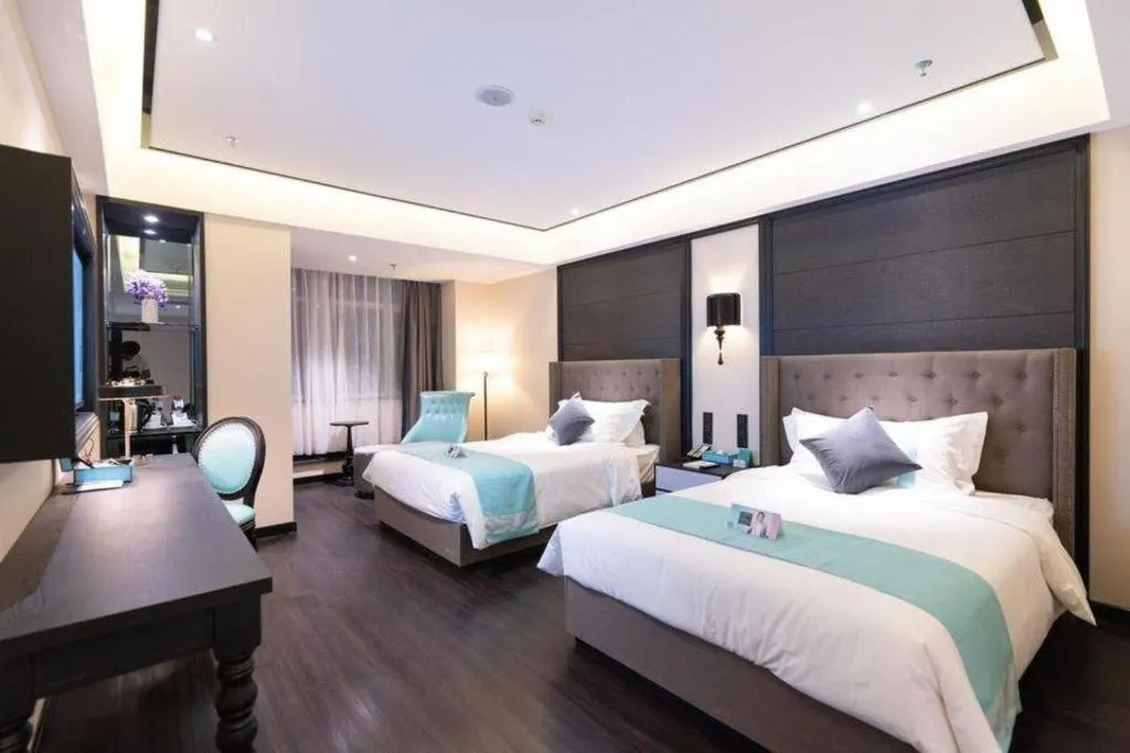 Bed in Xana Hotelle· Wulumuqi High Speed Railway Station Baonengcheng