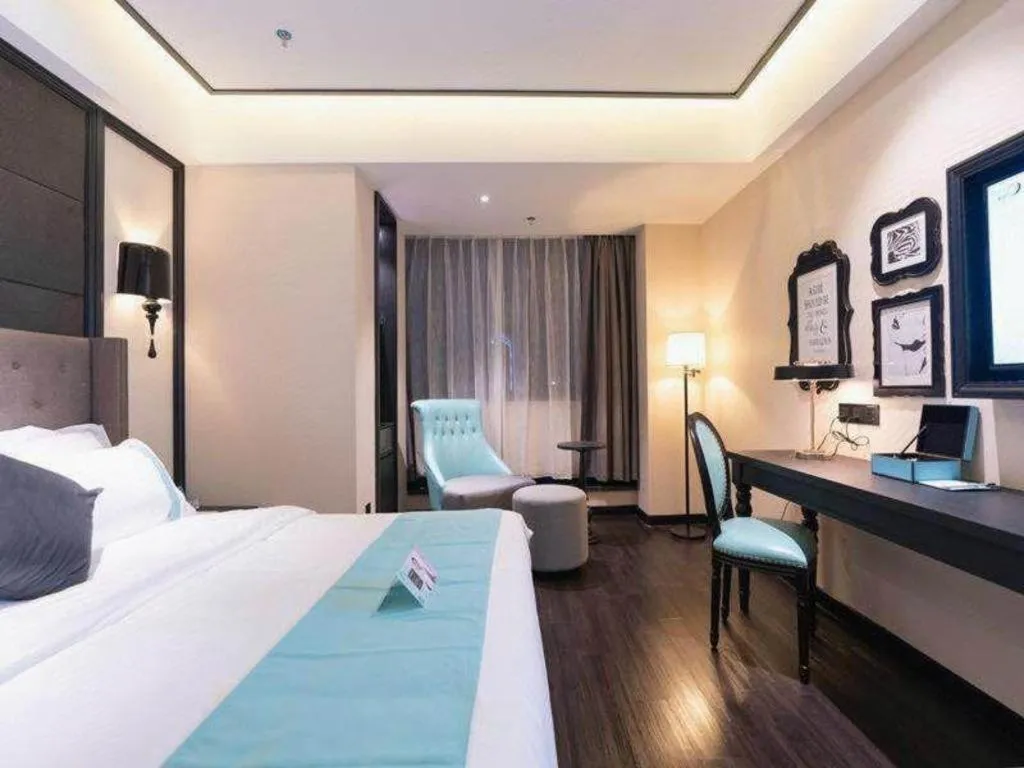 Bed in Xana Hotelle· Wulumuqi High Speed Railway Station Baonengcheng