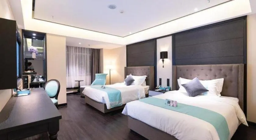 Bed in Xana Hotelle· Wulumuqi High Speed Railway Station Baonengcheng