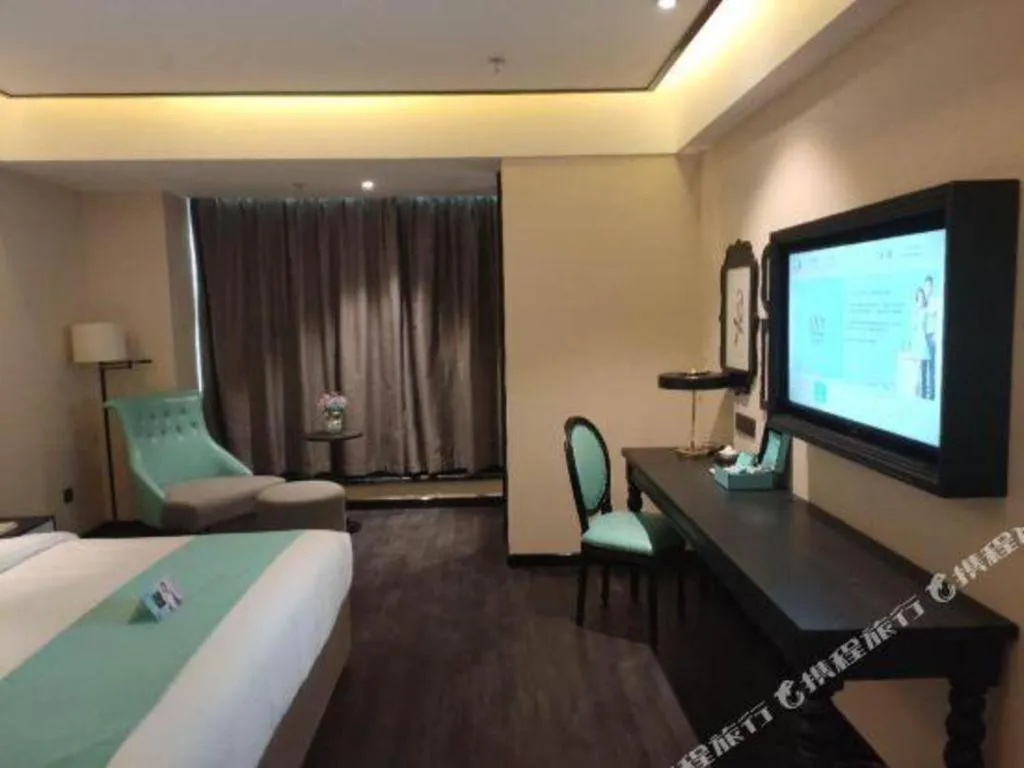 Bed in Xana Hotelle· Wulumuqi High Speed Railway Station Baonengcheng