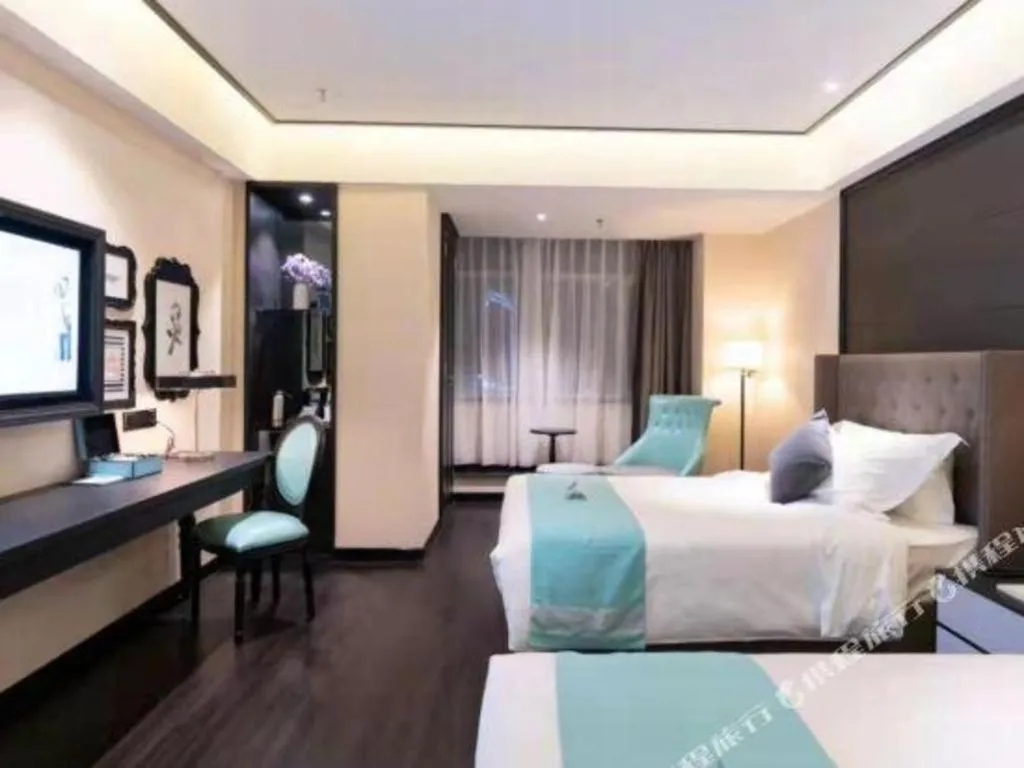 Bed in Xana Hotelle· Wulumuqi High Speed Railway Station Baonengcheng