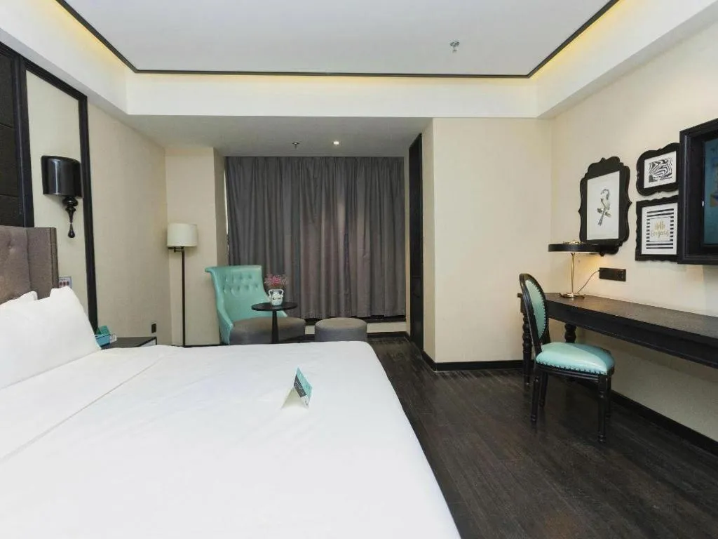 Bed in Xana Hotelle· Wulumuqi High Speed Railway Station Baonengcheng