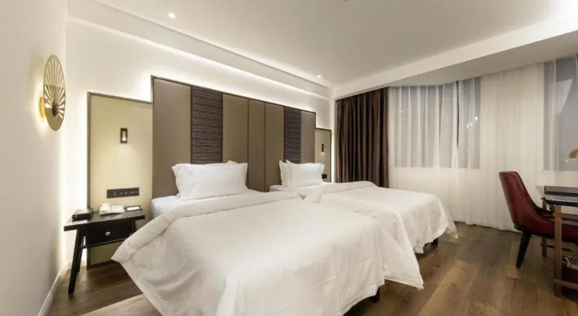 Bed in Jinjiang Metropolo Haikou East High Speed Railway Station Normal University