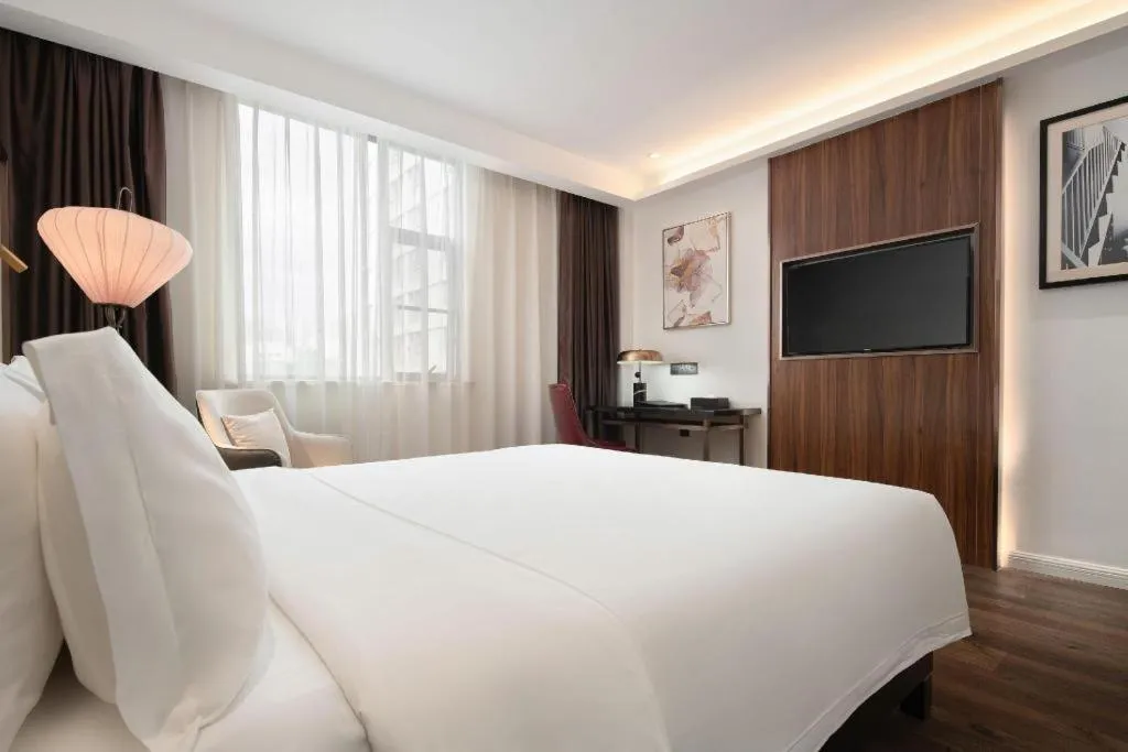 Bed in Jinjiang Metropolo Haikou East High Speed Railway Station Normal University