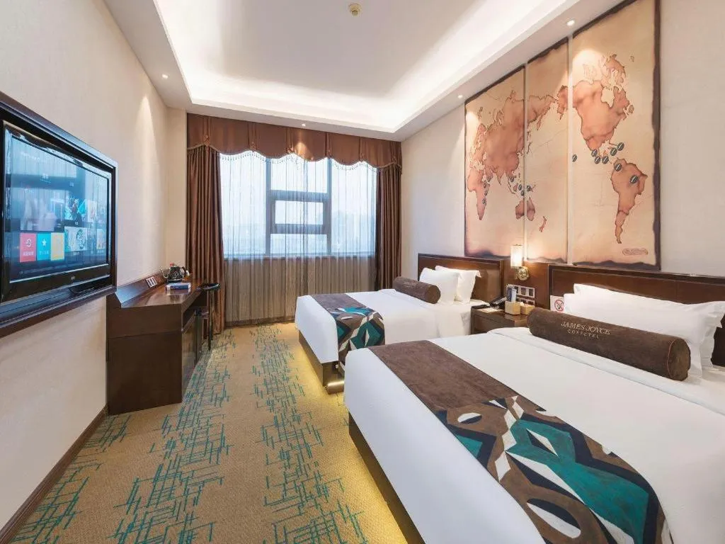 Bed in James Joyce Coffetel· Tianjin Olympic Center Lingbin Road Metro Station