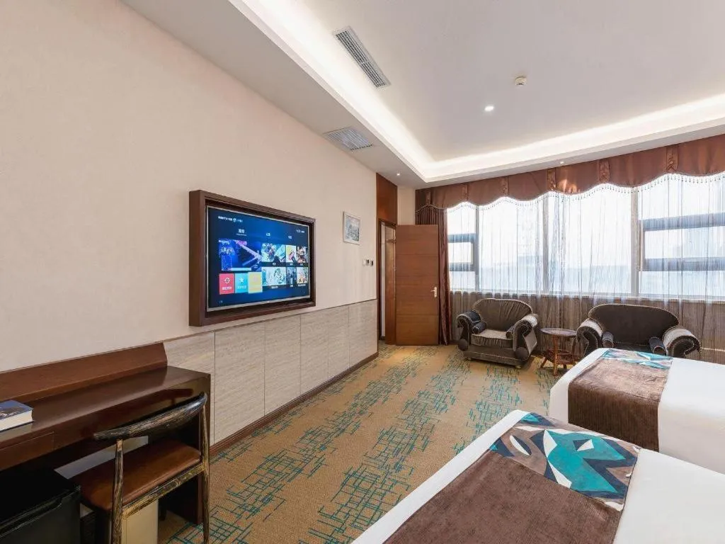 Bed in James Joyce Coffetel· Tianjin Olympic Center Lingbin Road Metro Station