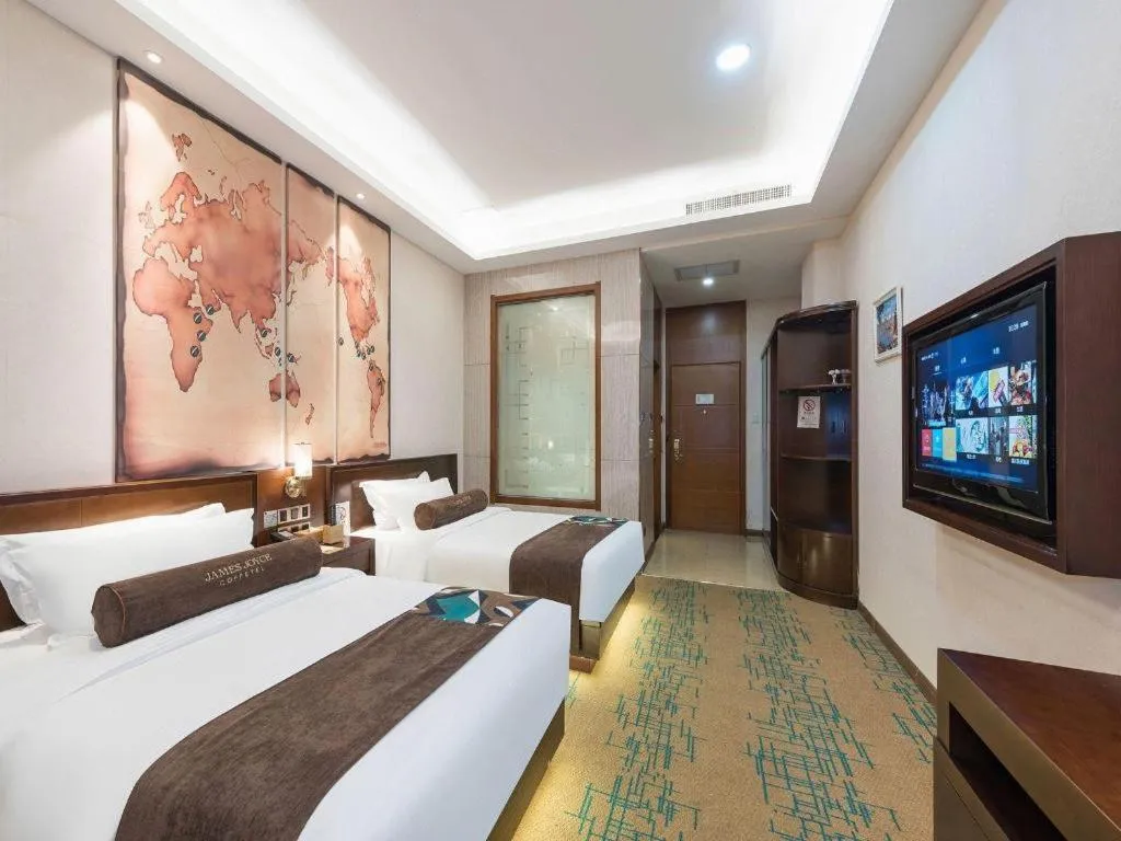 Bed in James Joyce Coffetel· Tianjin Olympic Center Lingbin Road Metro Station