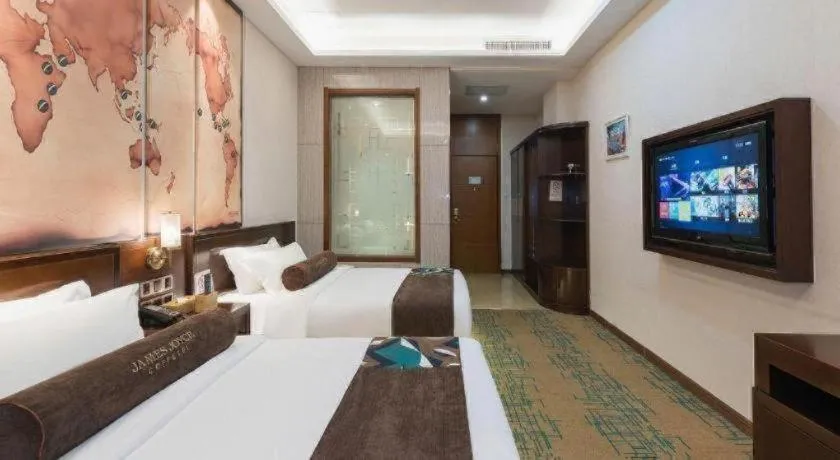 Bed in James Joyce Coffetel· Tianjin Olympic Center Lingbin Road Metro Station