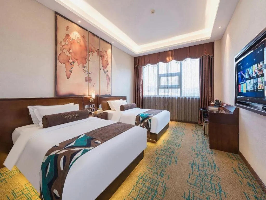 Bed in James Joyce Coffetel· Tianjin Olympic Center Lingbin Road Metro Station