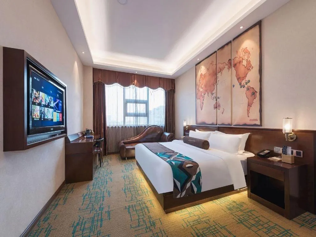 Bed in James Joyce Coffetel· Tianjin Olympic Center Lingbin Road Metro Station