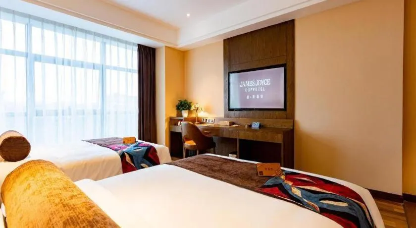 Bed in James Joyce Coffetel· Chengdu Shuangliu Airport Haibing City Wanda