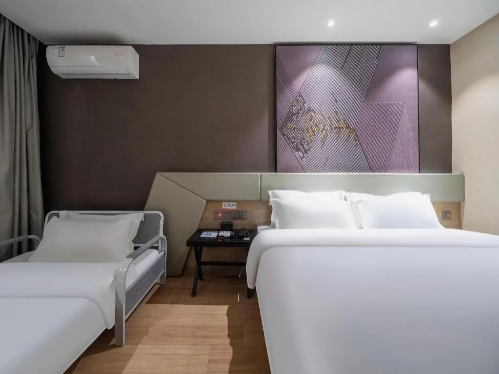 Bed in IU Hotels· Tianjin Houtai Chengjian University Haitai Industrial Park