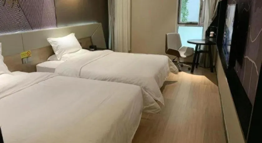 Bed in IU Hotels· Tianjin Houtai Chengjian University Haitai Industrial Park