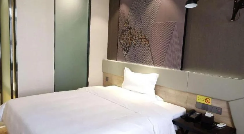 Bed in IU Hotels· Tianjin Houtai Chengjian University Haitai Industrial Park