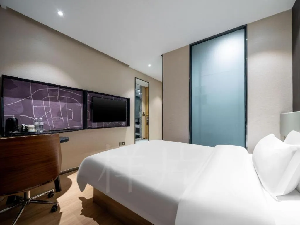 Bed in IU Hotels· Tianjin Houtai Chengjian University Haitai Industrial Park