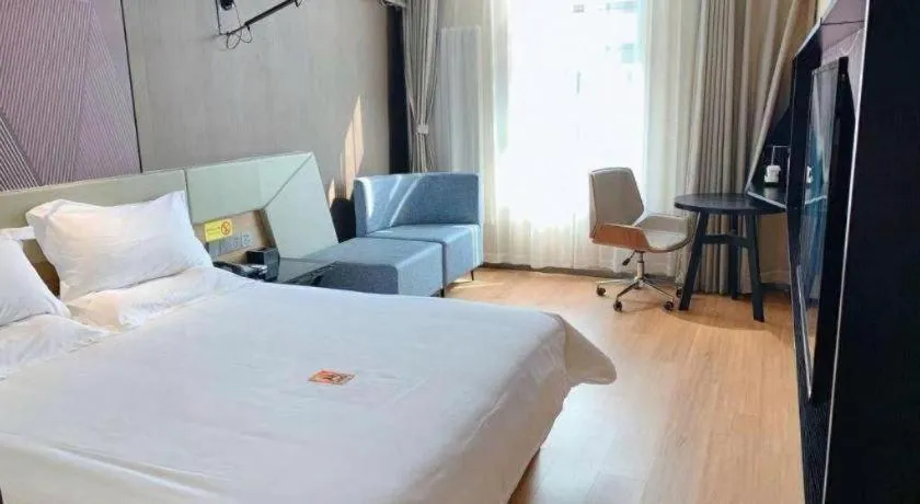 Bed in IU Hotels· Tianjin Houtai Chengjian University Haitai Industrial Park