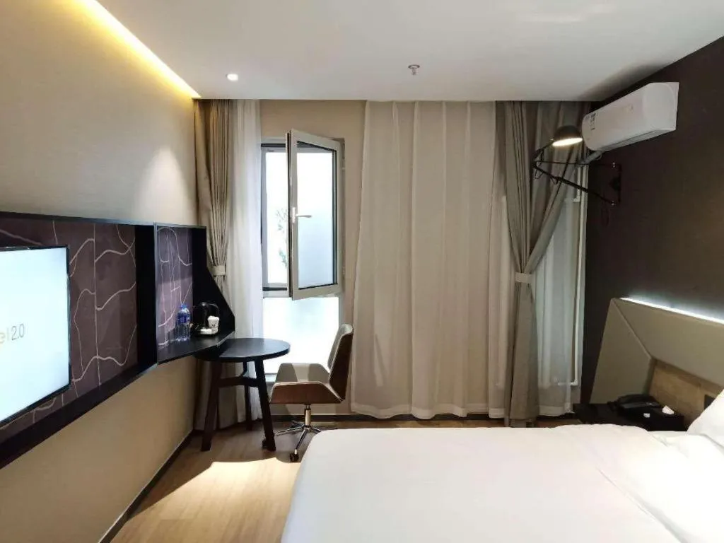 Bed in IU Hotels· Tianjin Houtai Chengjian University Haitai Industrial Park