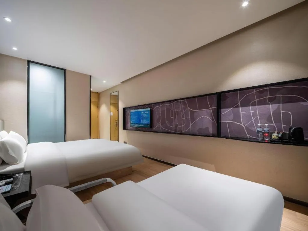 Bed in IU Hotels· Tianjin Houtai Chengjian University Haitai Industrial Park