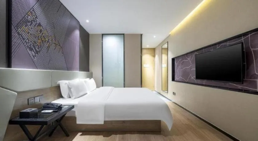Bed in IU Hotels· Tianjin Houtai Chengjian University Haitai Industrial Park